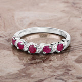 0.69 Carat Genuine Ruby and White Topaz .925 Sterling Silver Ring