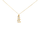 10k Yellow Gold 1/4 Cttw Diamond 3 Stone Swirl and Drop Pendant Necklace