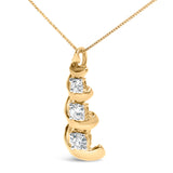 10k Yellow Gold 1/4 Cttw Diamond 3 Stone Swirl and Drop Pendant Necklace