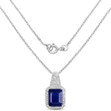4.72 Carat Glass Filled Sapphire and White Topaz .925 Sterling Silver Pendant