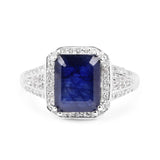 4.80 Carat Glass Filled Sapphire and White Topaz .925 Sterling Silver Ring
