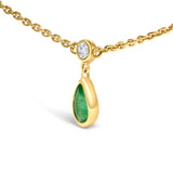 10K Yellow Gold Dangling 5x3 mm Green Emerald and Diamond Station Necklace - 18" Inches