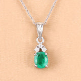 0.64 Carat Genuine Zambian Emerald and White Diamond 10K White Gold Pendant