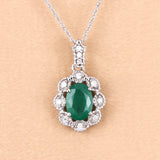 0.79 Carat Genuine Zambian Emerald and White Diamond 10K White Gold Pendant