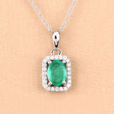 0.83 Carat Genuine Zambian Emerald and White Diamond 10K White Gold Pendant