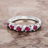0.69 Carat Genuine Ruby and White Topaz .925 Sterling Silver Ring